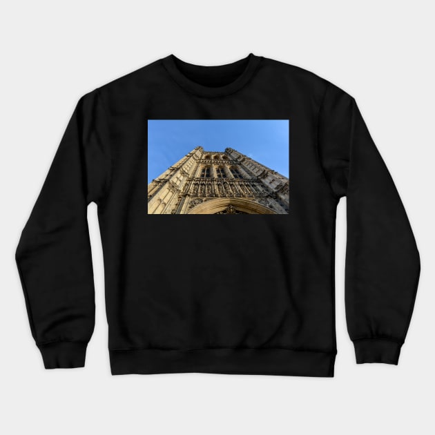 Victoria Tower against blue sky Crewneck Sweatshirt by lena-maximova